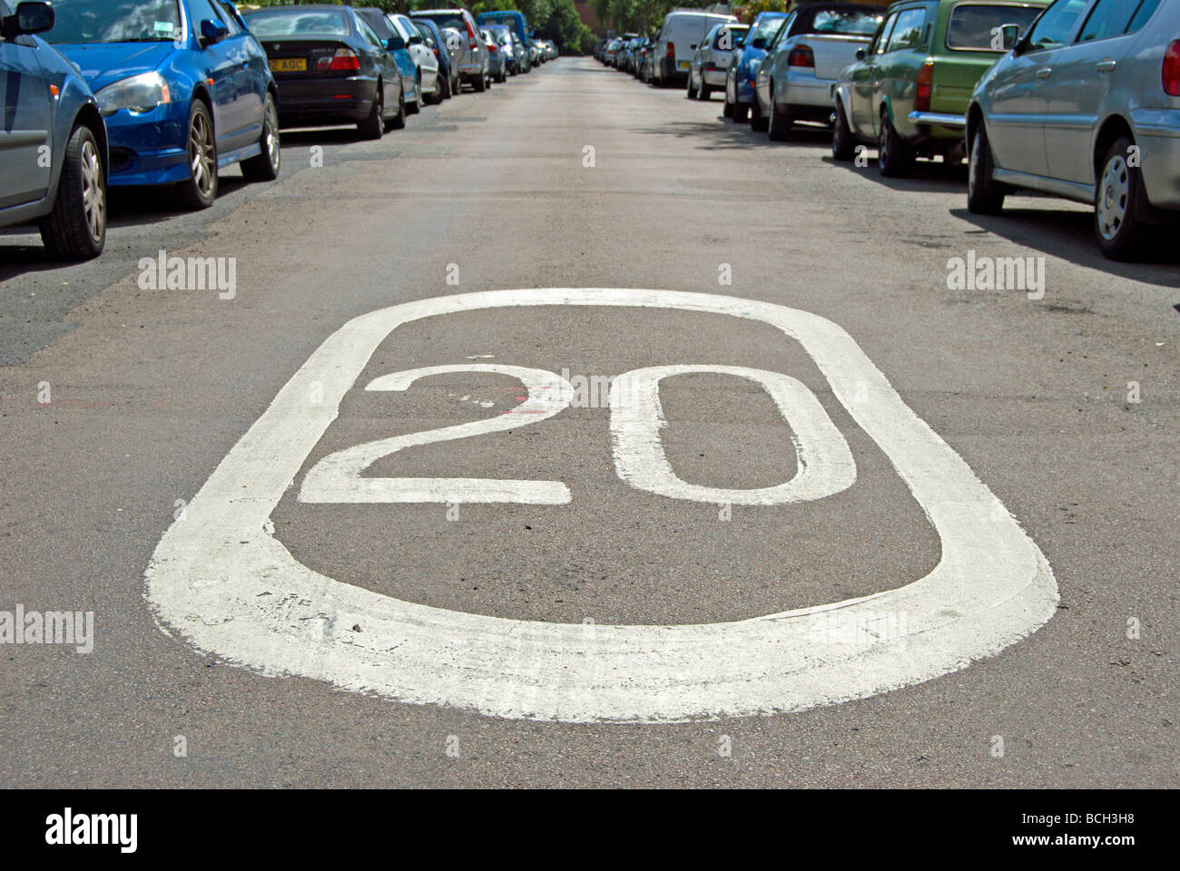 british road markings indicating a 20 miles per hour speed limit Stock Photo