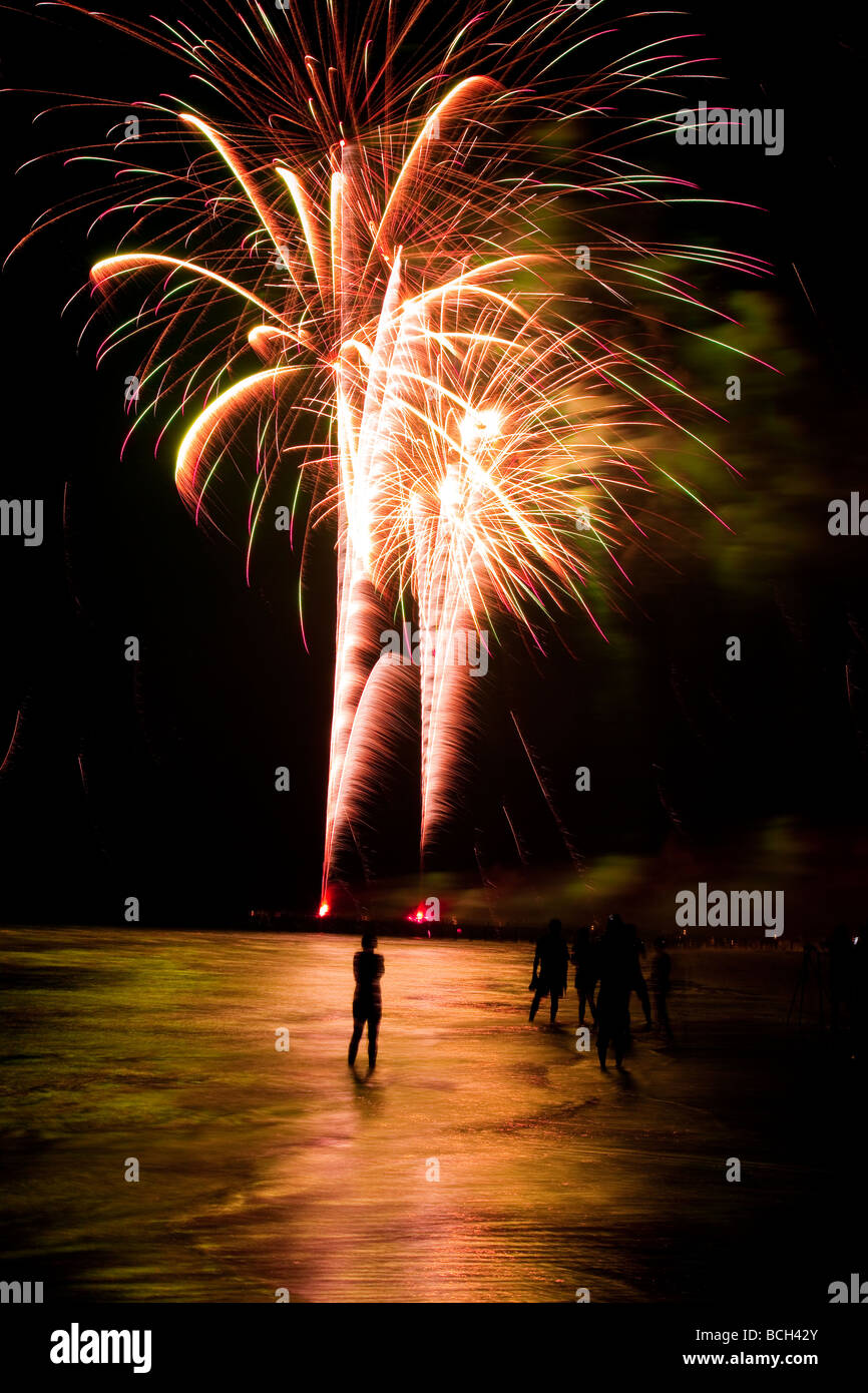 Fireworks explode along the beach at Isle of Palms SC marking