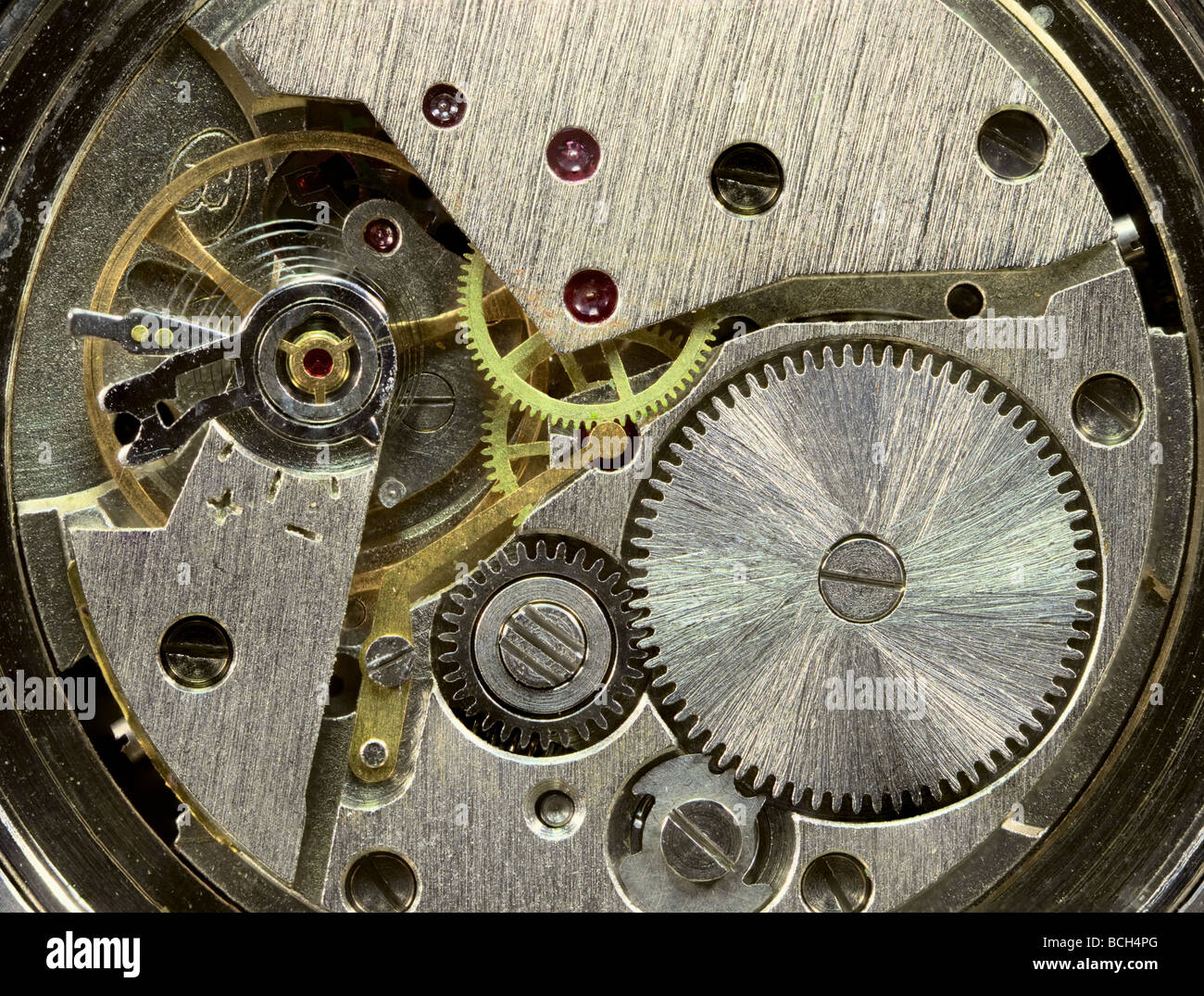 Macrophoto of a tiny old clockwork background Stock Photo