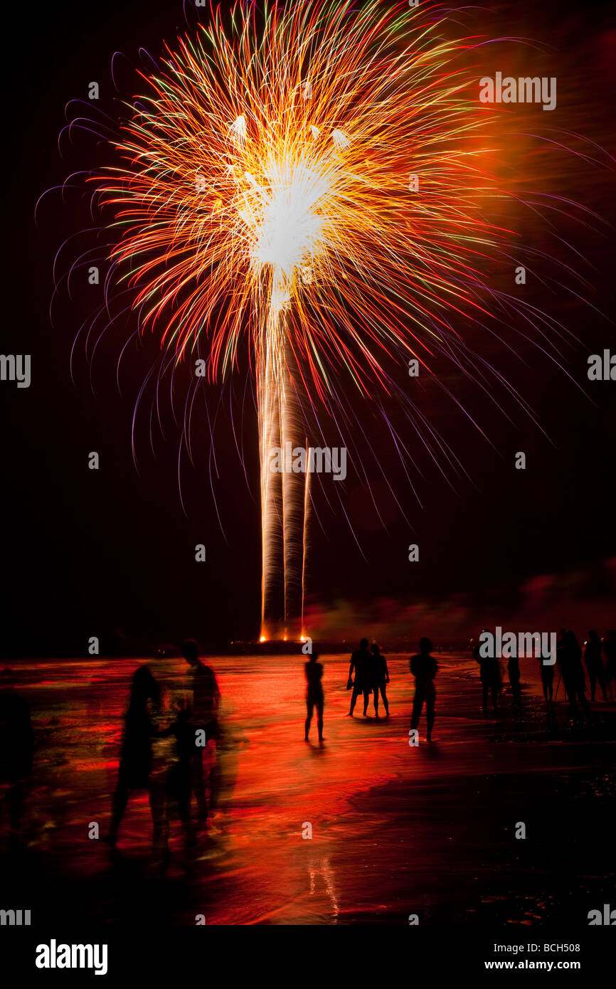 Fireworks explode along the beach at Isle of Palms SC marking