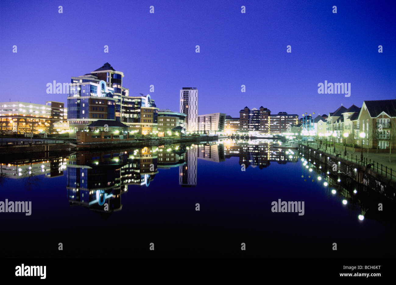Salford Quays lit up at night, Manchester, England, UK Stock Photo