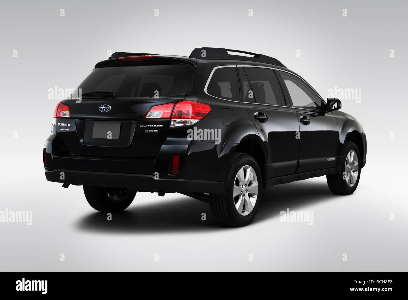 2010 Subaru Outback 3.6 R in Black - Rear angle view Stock Photo