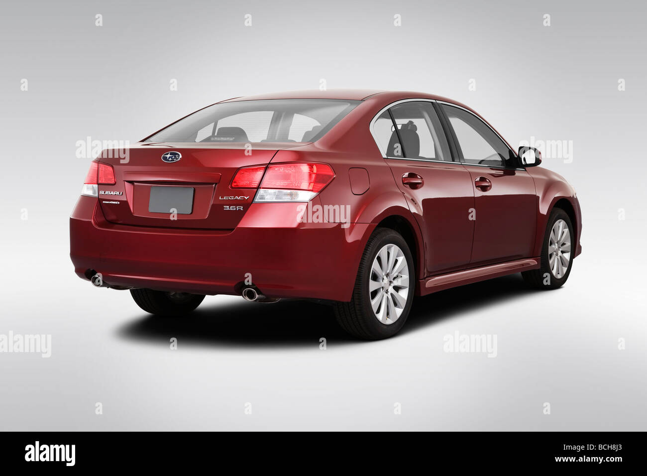 2010 Subaru Legacy 3.6R in Red - Rear angle view Stock Photo
