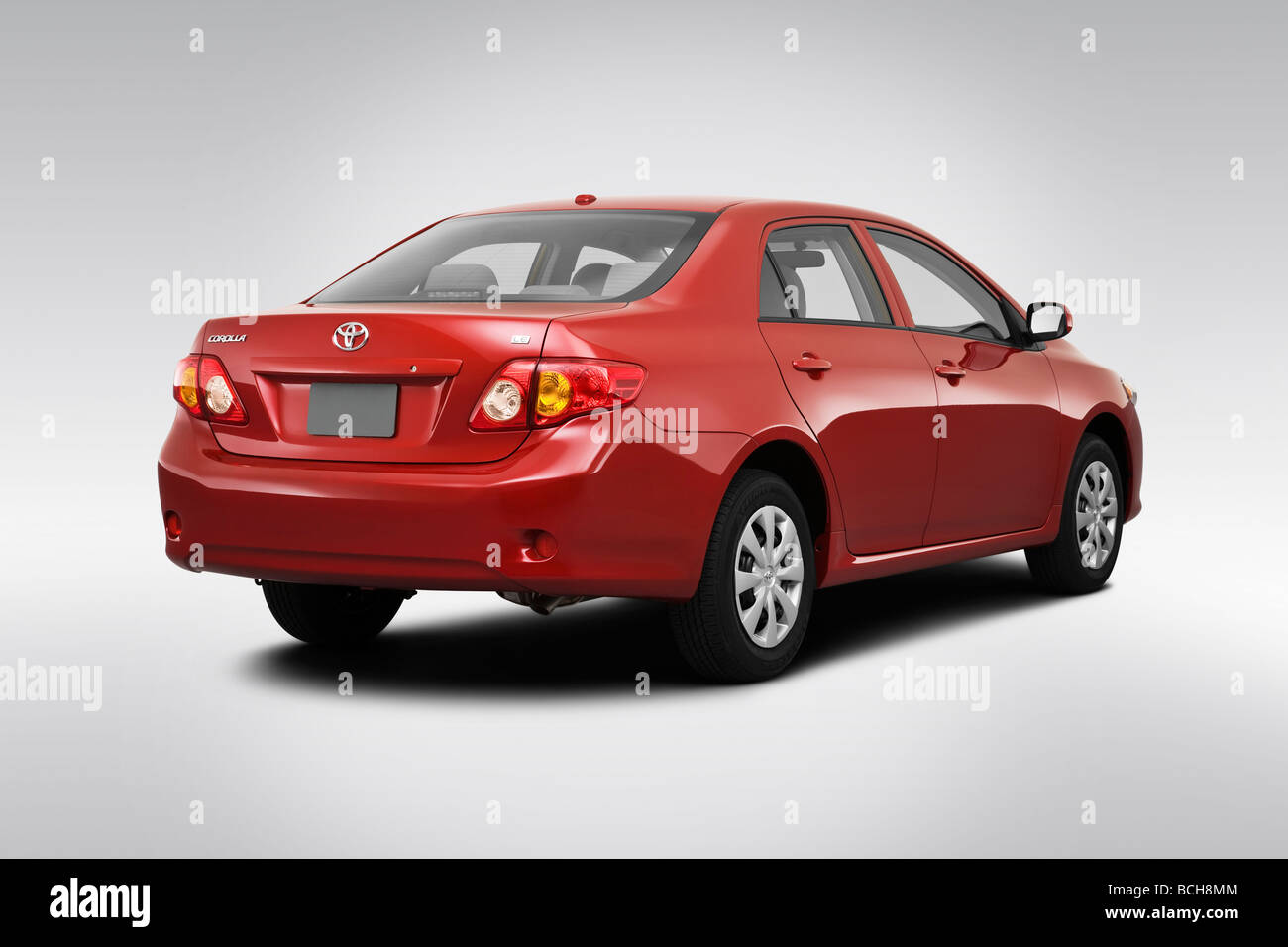 2010 Toyota Corolla Le In Red Rear Angle View Stock Photo
