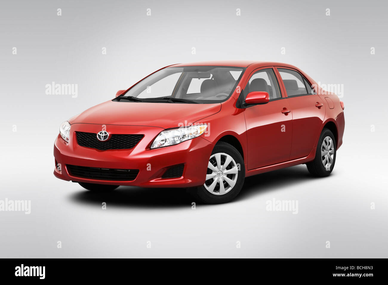 2010 Toyota Corolla Le In Red Front Angle View Stock Photo