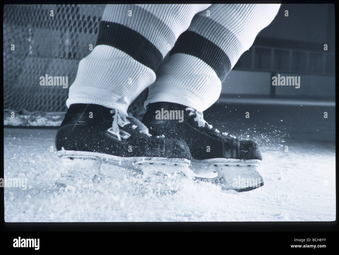Close-up of Hockey Players Skate on Ice Anchorage AK Stock Photo