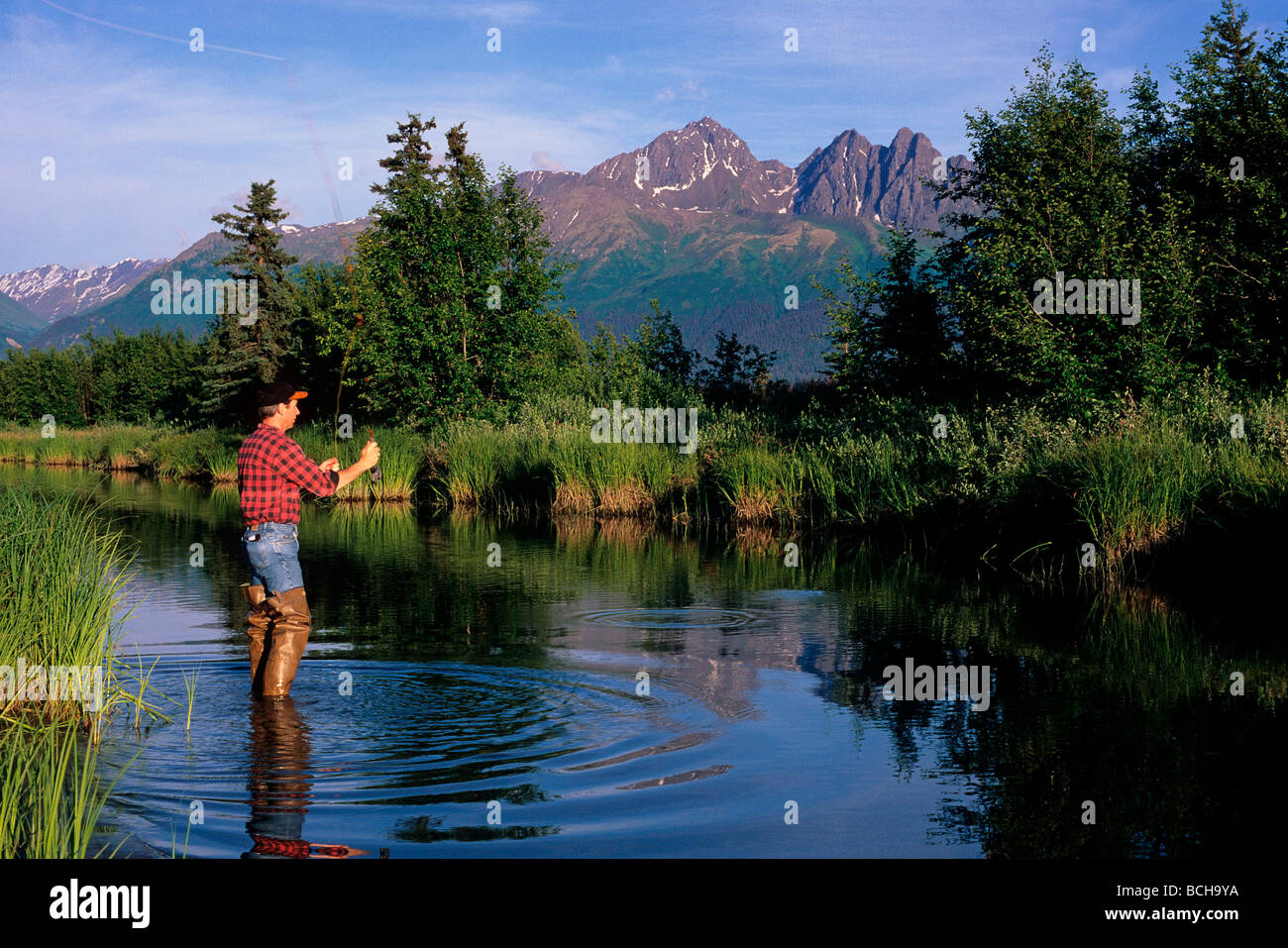 Man Fly Fishing Rabbit Ck Palmer Hay Flats AK Spring w & w/o Kayak
