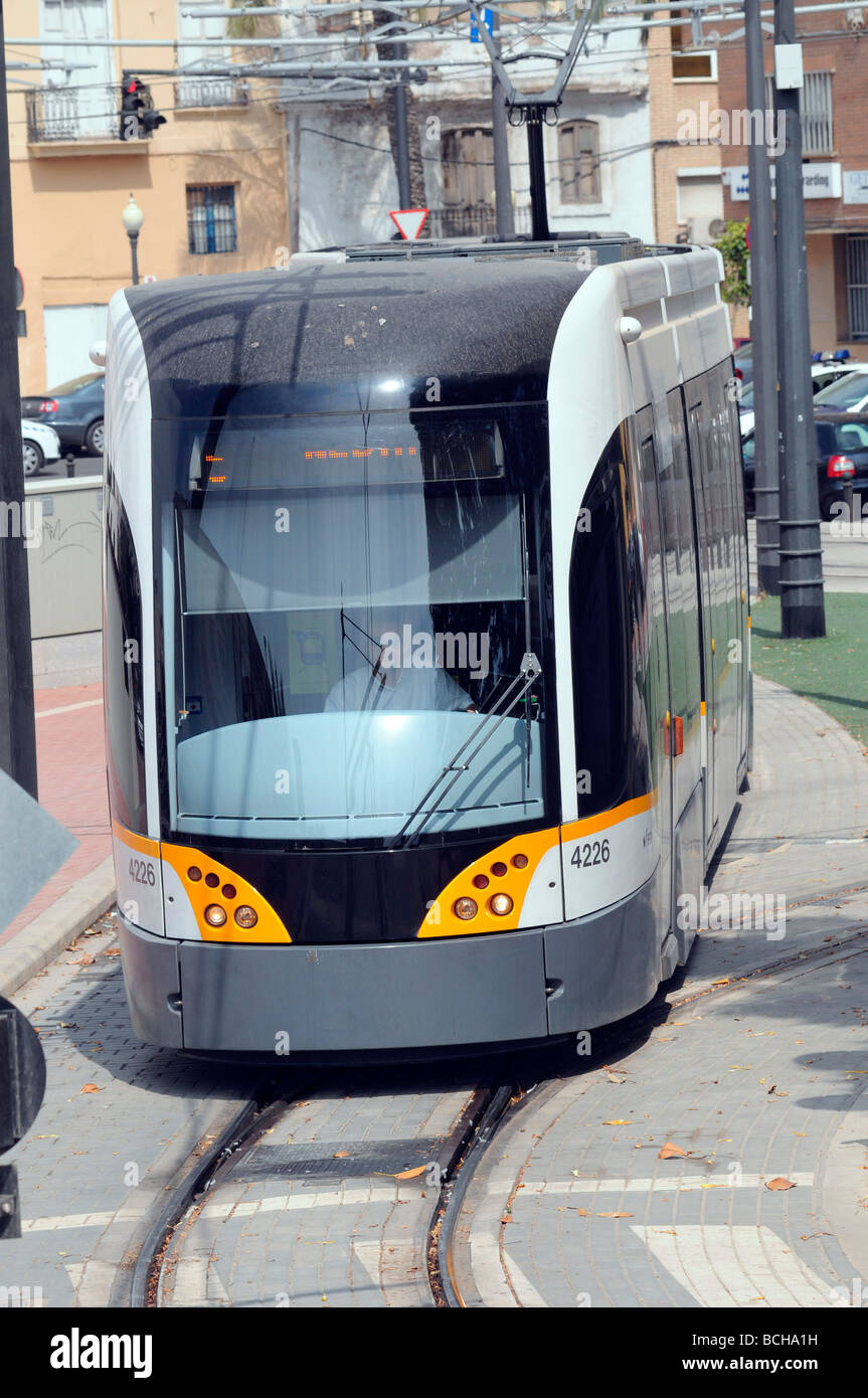 Line 4 is an overhead tram which connects the city of Valencia to the beach. Valencia, Spain Stock Photo