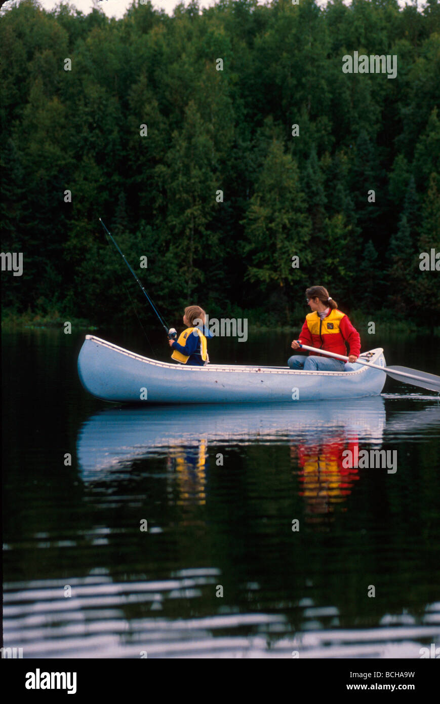 Mother & Boy Fishing in Canoe Nancy Lake SC AK Stock Photo Alamy