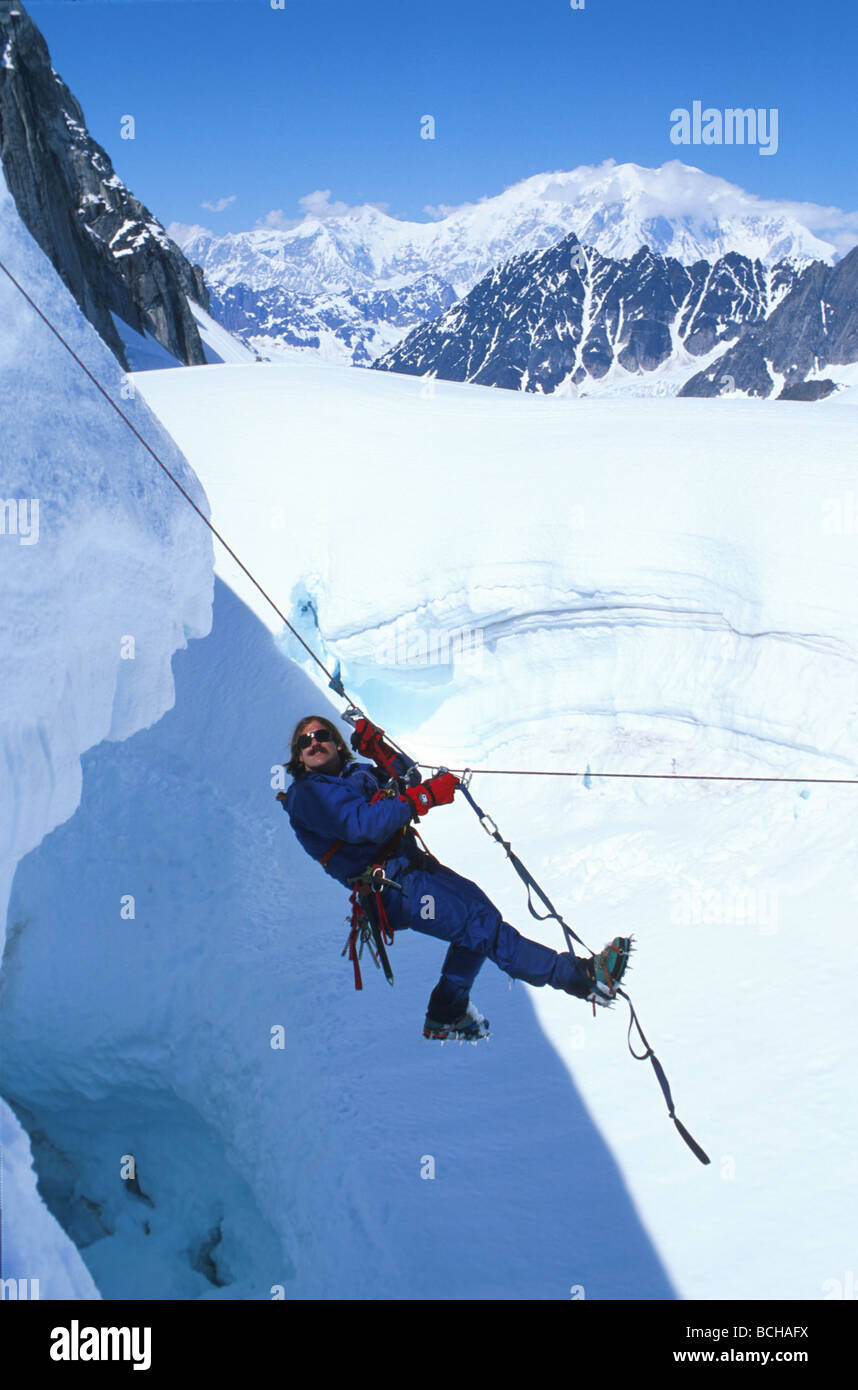 Climber Hanging Rope Alaska Range Glacier Crevasse AK Southcentral Spring Scenic Stock Photo