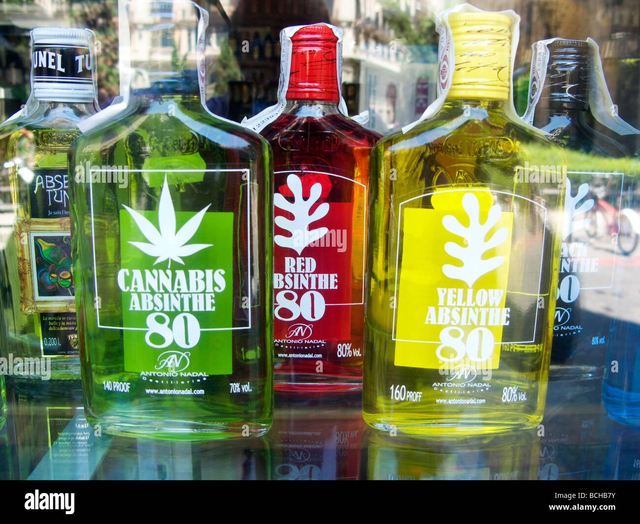 Colorful absinthe on sale in shop window , Barcelona Stock Photo