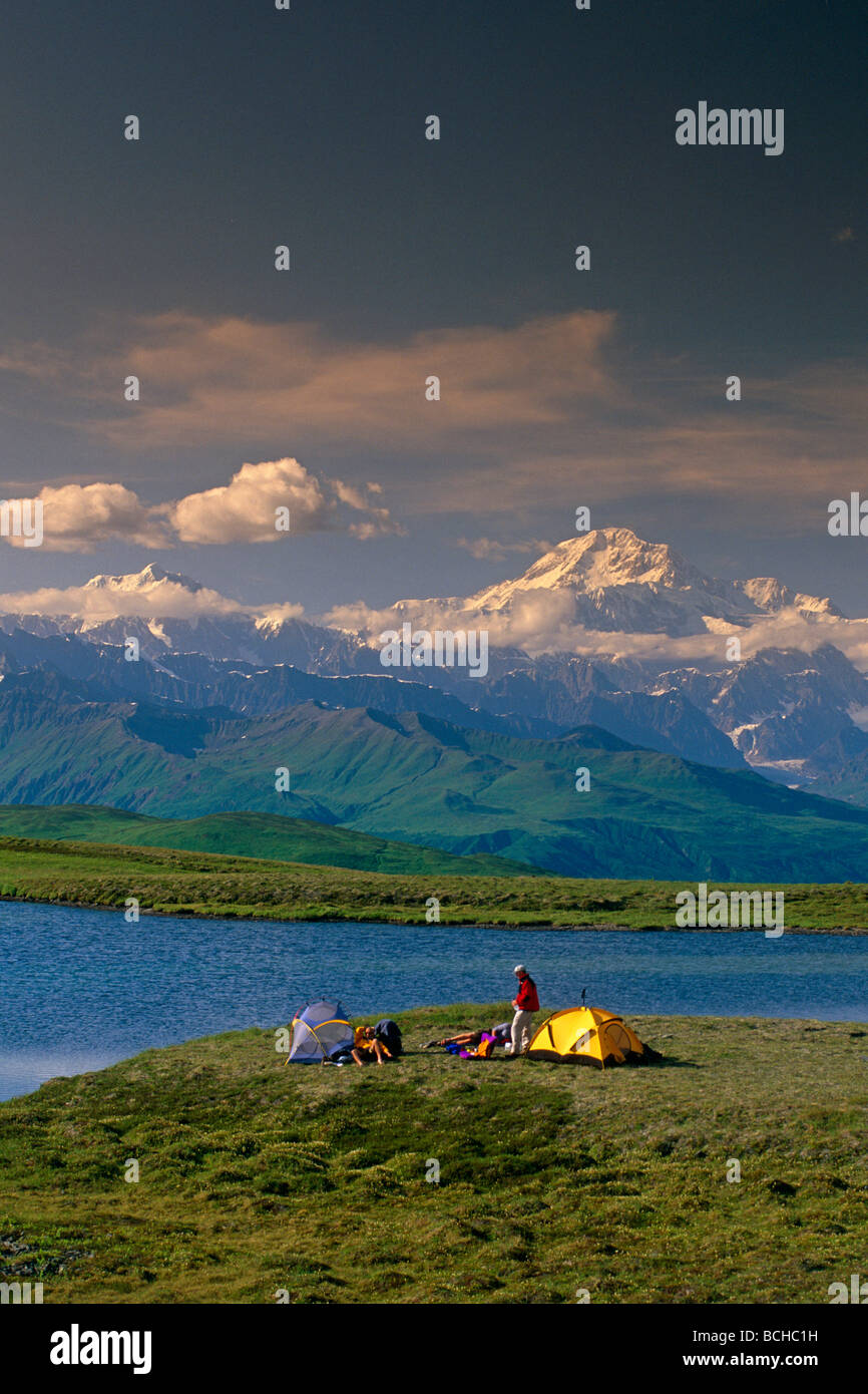 Hikers @ Camp near Tundra Pond Denali SP SC AK Summer/nw/Mt McKinley background Stock Photo