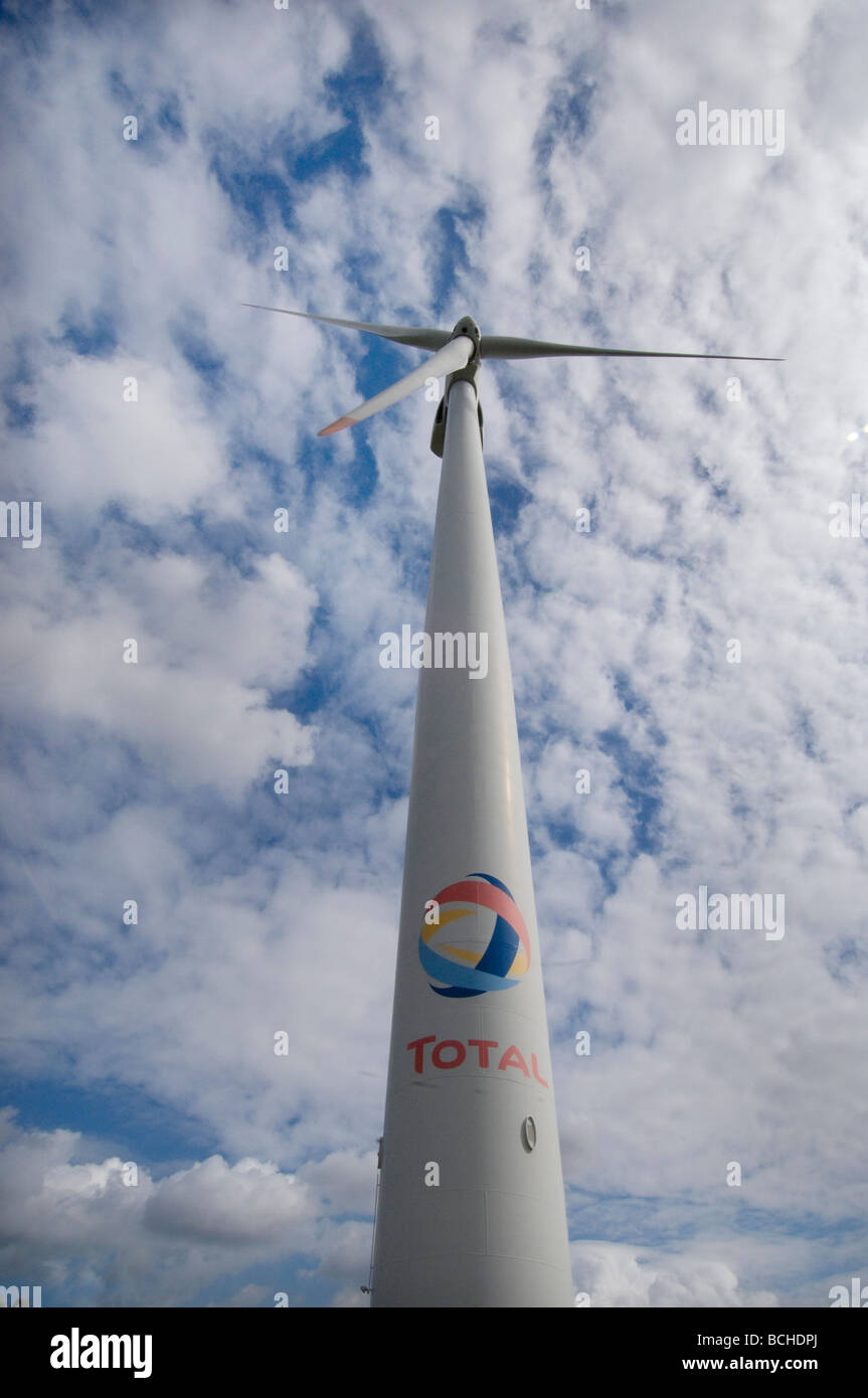 A wind turbine owned by the Total oil company at a site in Dunkirk Northern France Stock Photo
