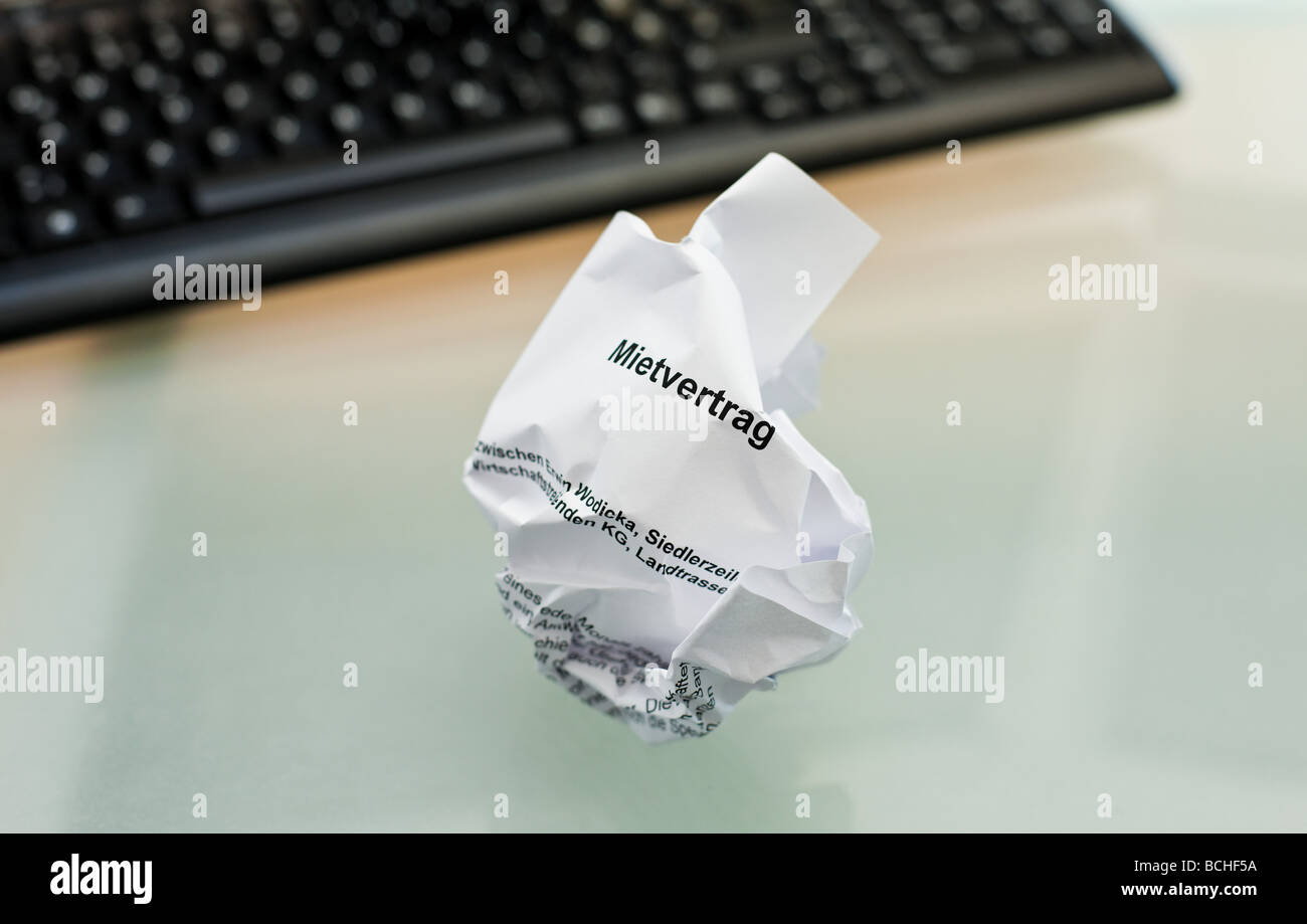 crumpled-up contract Stock Photo