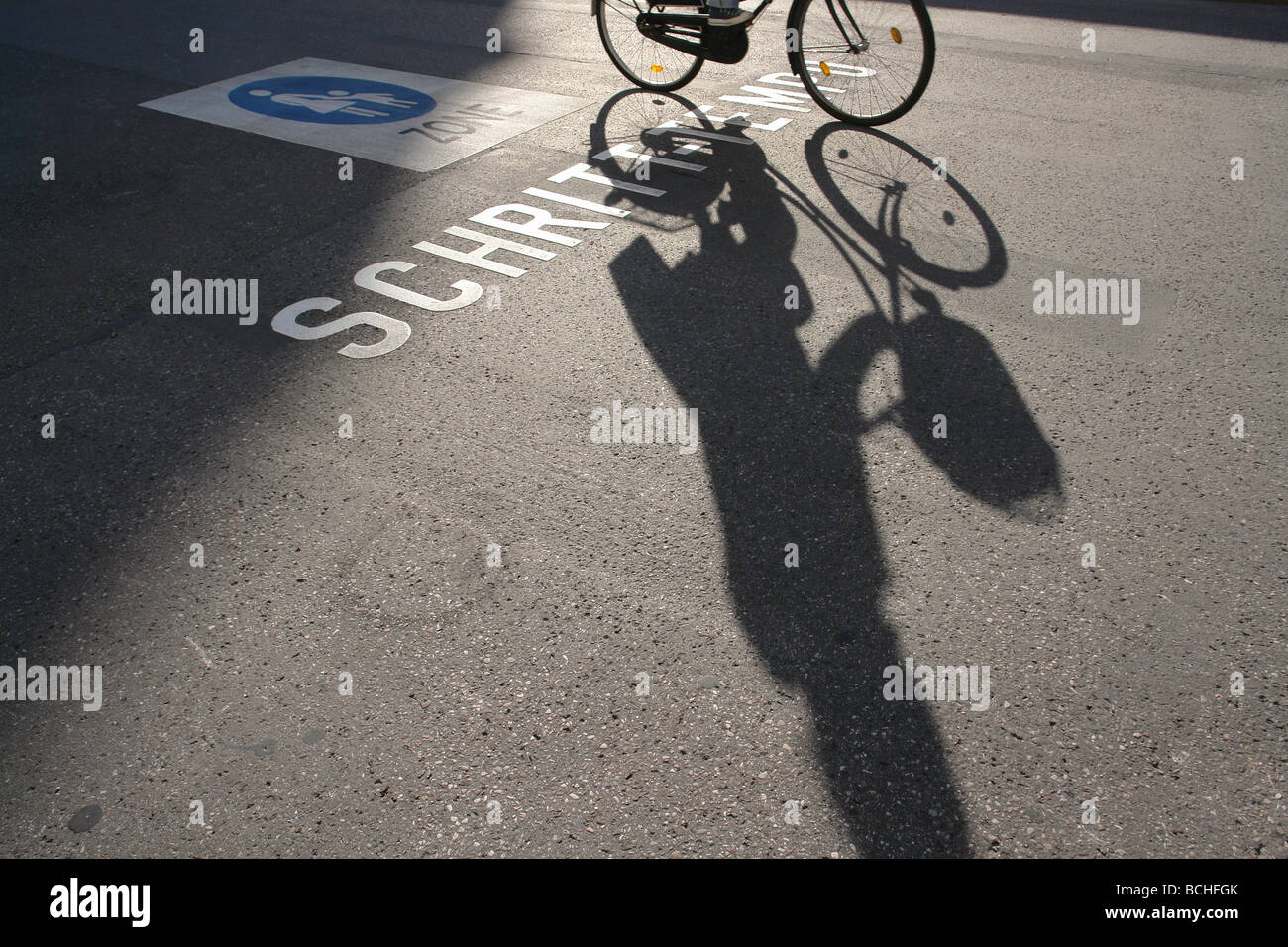 Drive slowly sign on the floor in pedestrian zone Munich Bavaria Germany Stock Photo