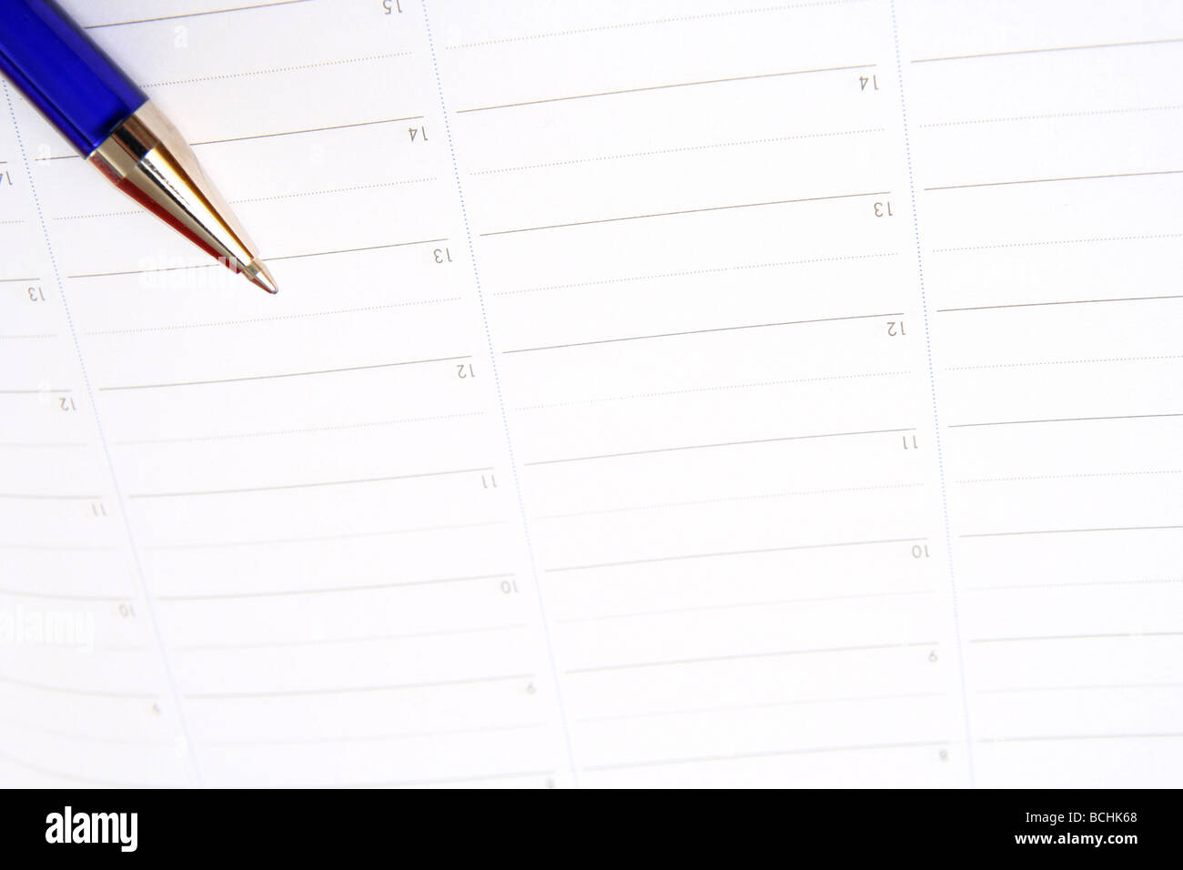 Close-up of color pencils and agenda Stock Photo