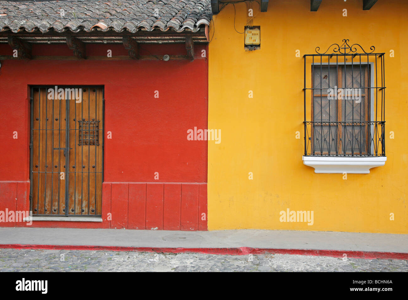 Door and window in Antigua Guatemala Stock Photo