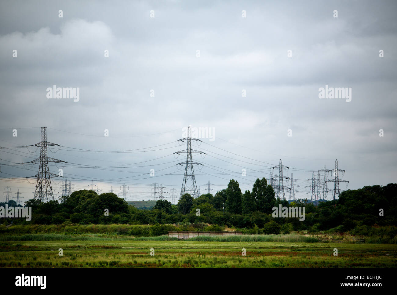 Electricity pylons at Rainham Marshes Essex Stock Photo
