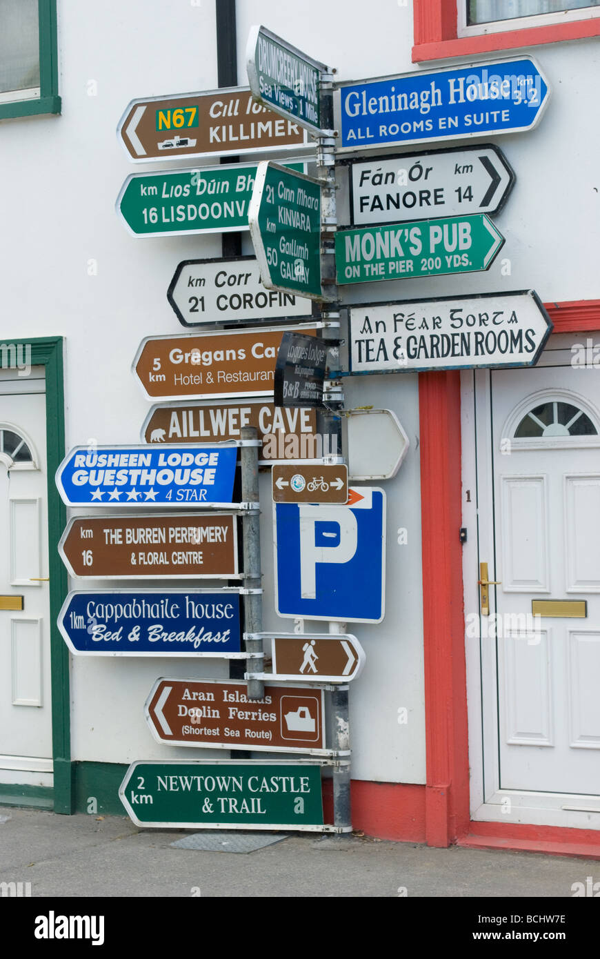 A jumble of signposts in The Burren, County Clare, Ireland Stock Photo