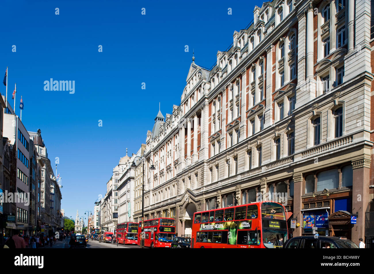 Traffic and pedestrians on The Strand WC2 London United Kingdom Stock Photo
