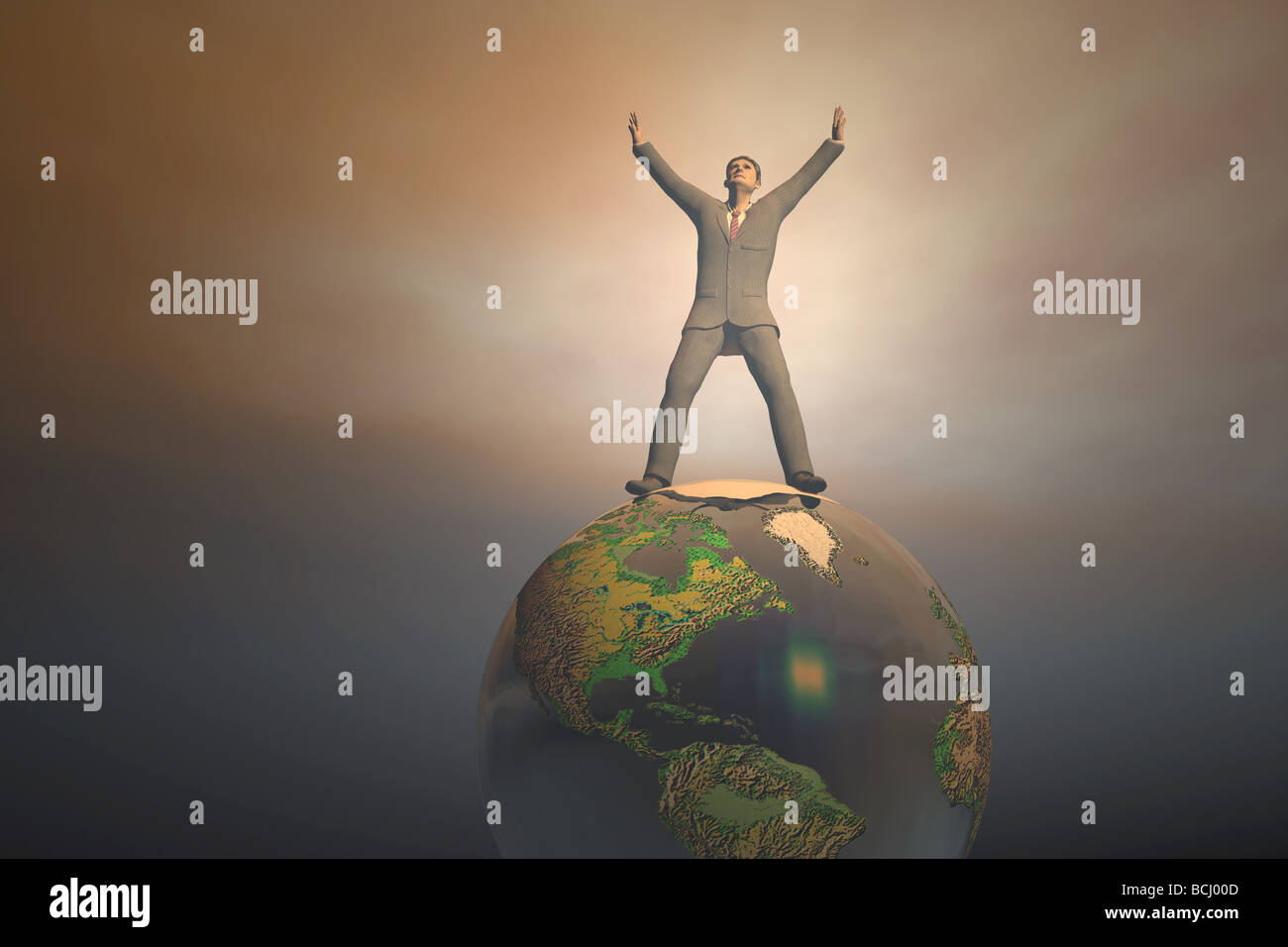 Businessman standing on top of the world Stock Photo