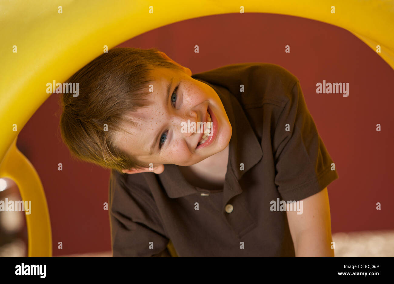 Portrait of a young boy at the playground Stock Photo - Alamy