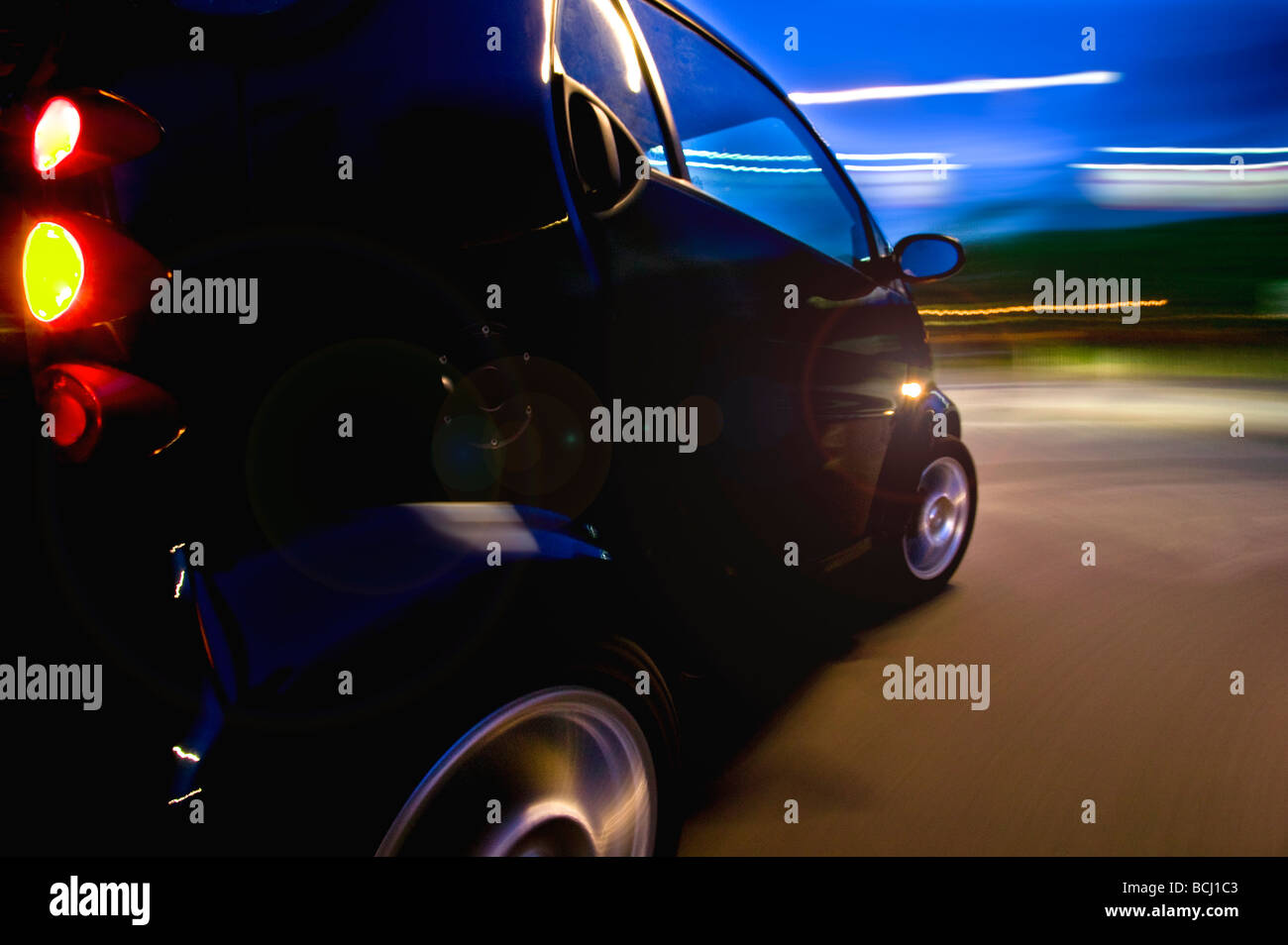 Smart Car night driving Stock Photo