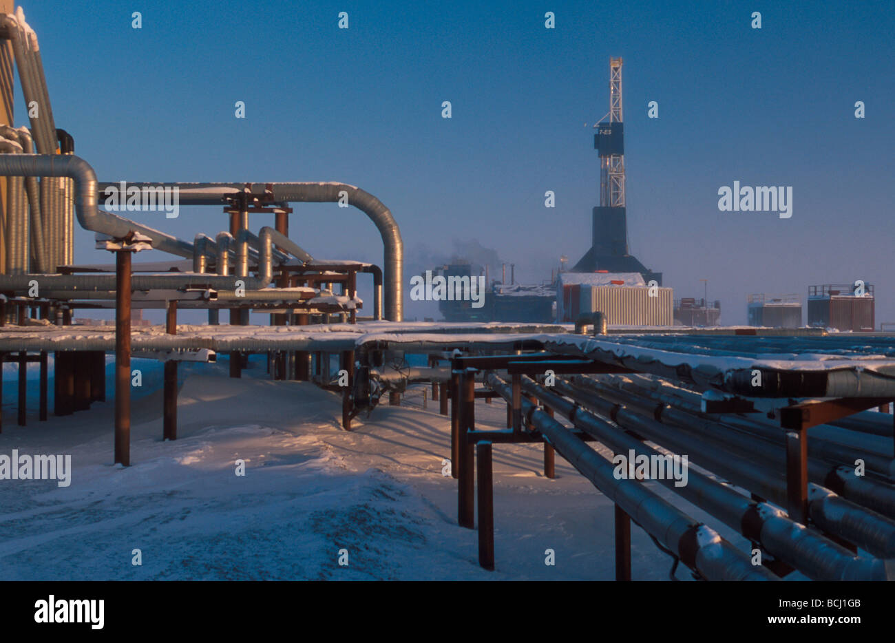 Drill Rigs and Pipes North Slope Arctic Alaska Stock Photo
