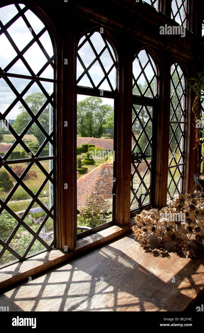 View through a medieval window at Great Dixter house Stock Photo