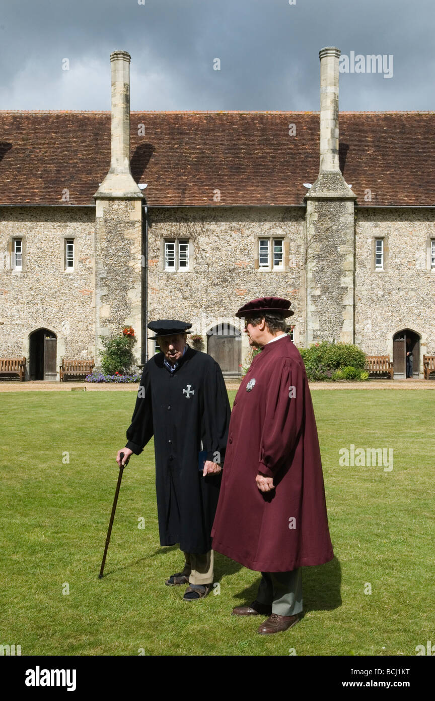 Hospital of St Cross Almshouse of Noble Poverty, Brethren two older men who are member of the community. Winchester Hampshire 2009 2000s HOMER SYKES Stock Photo