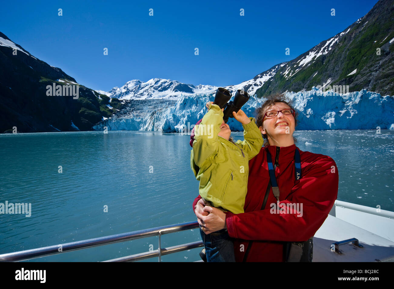 Mother and daughter enjoy a tour in Harriman Fjord aboard the Klondike Express in Southcentral Alaska Stock Photo