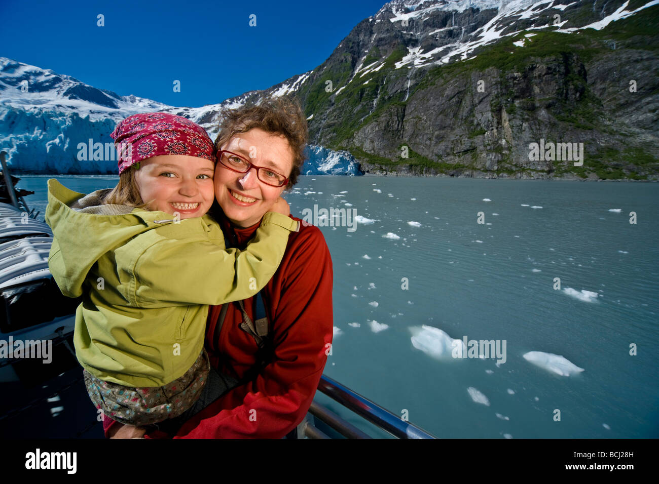 Mother and daughter enjoy a tour in Harriman Fjord aboard the Klondike Express in Southcentral Alaska Stock Photo