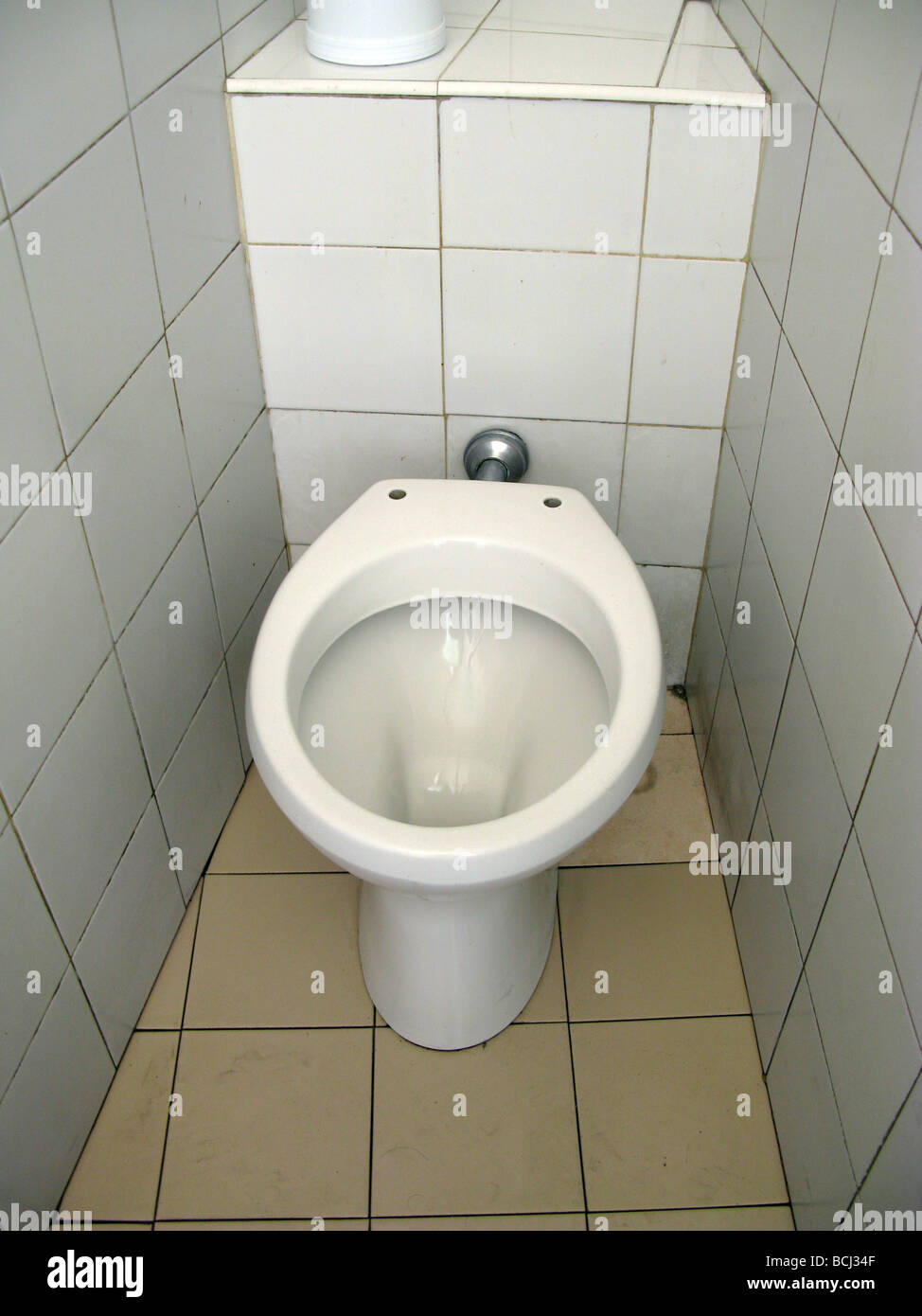 toilet pan without seat in small room Stock Photo Alamy