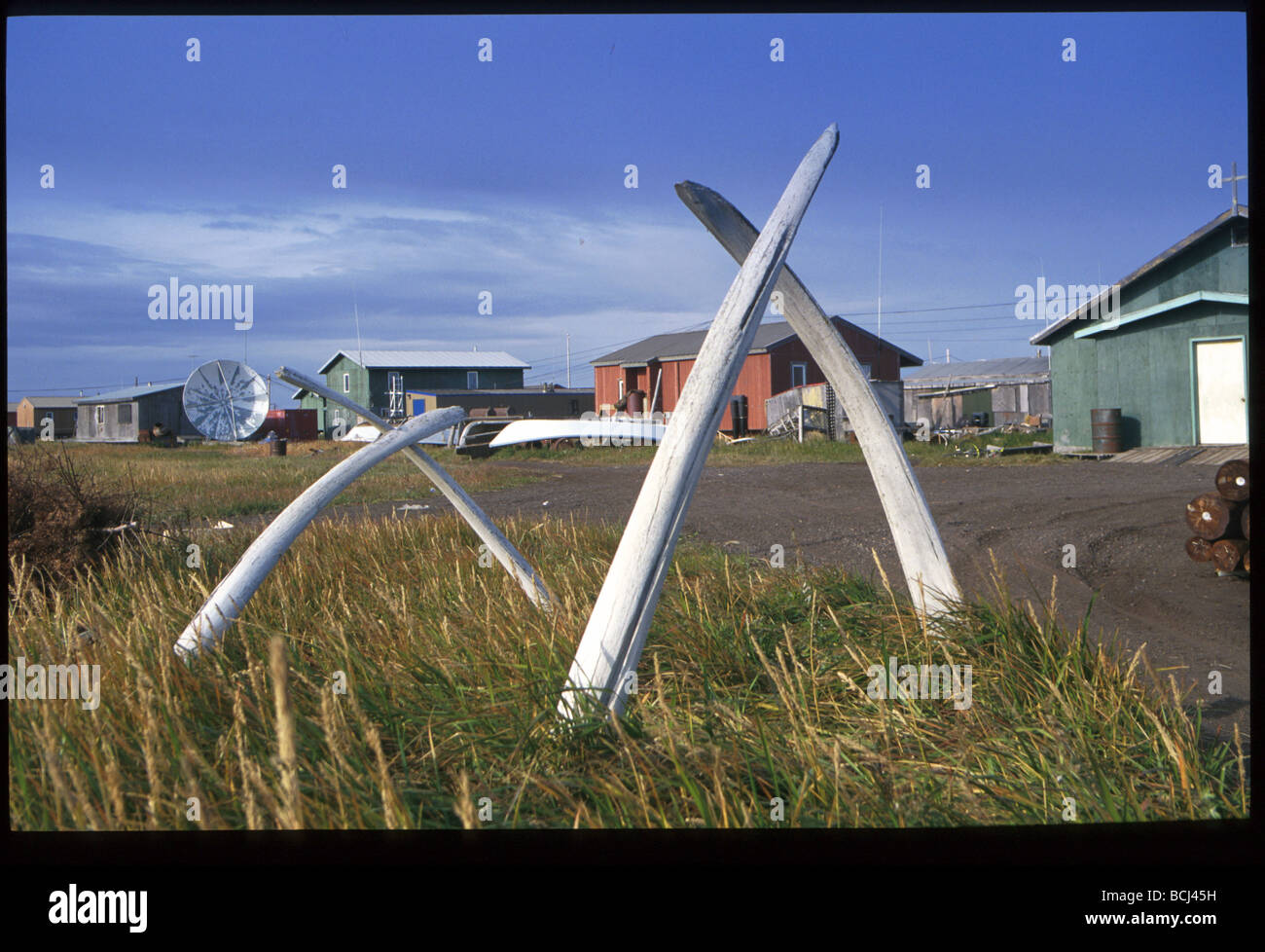 Village w/ whale bone markers Kivalina Western AK summer scenic Stock Photo