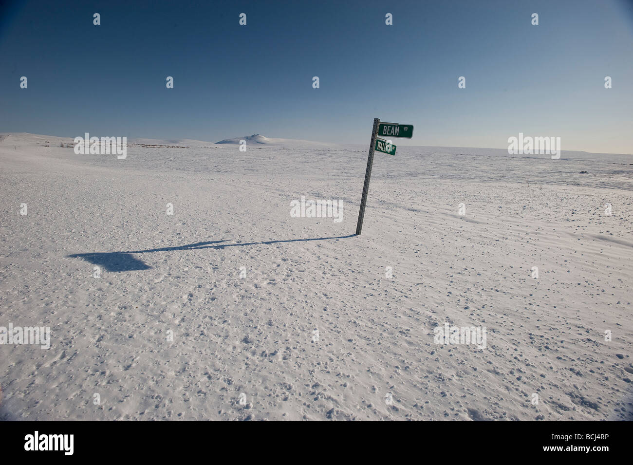Street sign out in the barren snowcovered tundra near Nome, Alaska