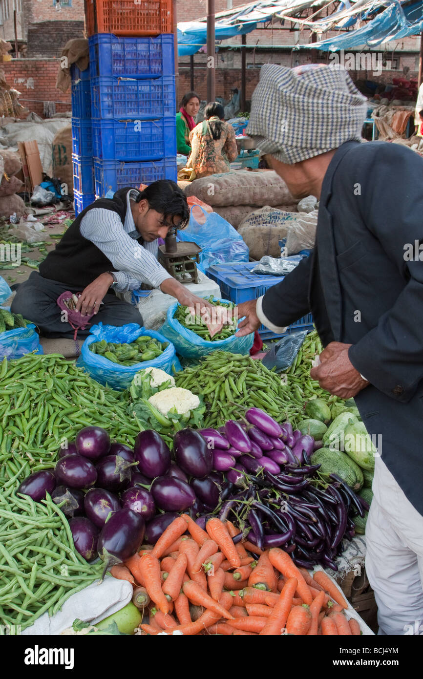 Kathmandu, Nepal. Neighborhood Vegetable Market. Customer Receiving