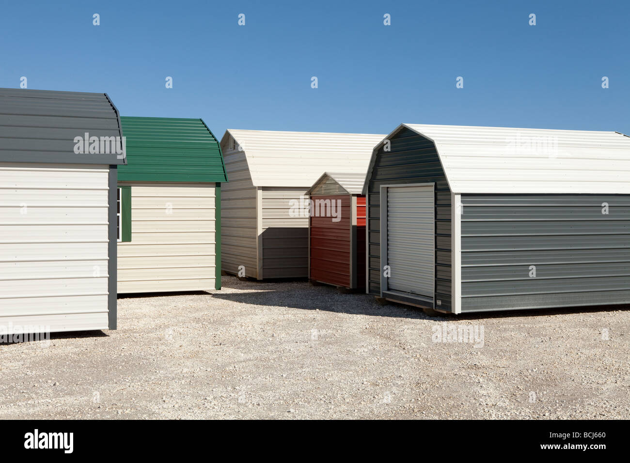 Portable metal storage sheds on display in lot Texas USA Stock Photo