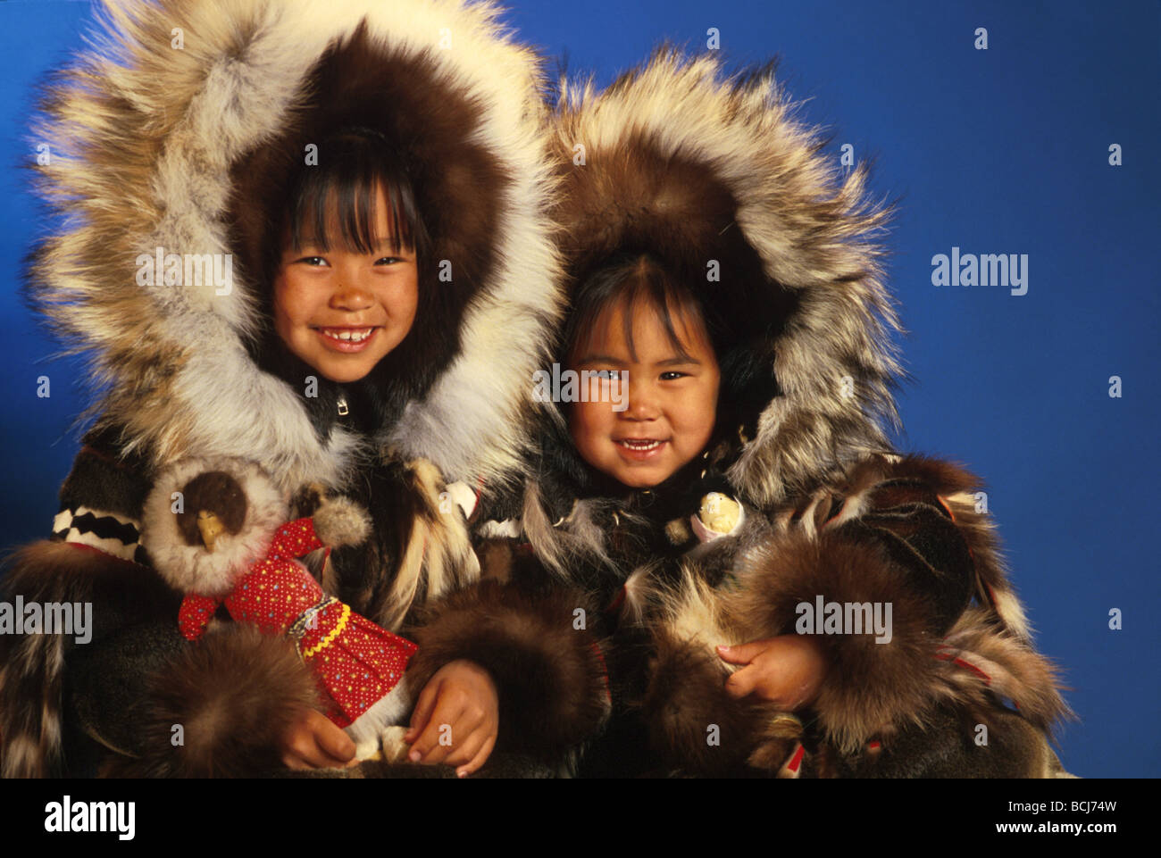 Eskimo Girls in seal fur parka studio portrait Stock Photo - Alamy