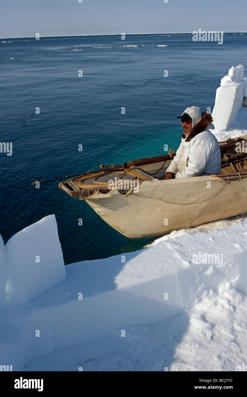 Native Hunter w/ Skin Boat Looking for Whales Barrow AK Stock Photo