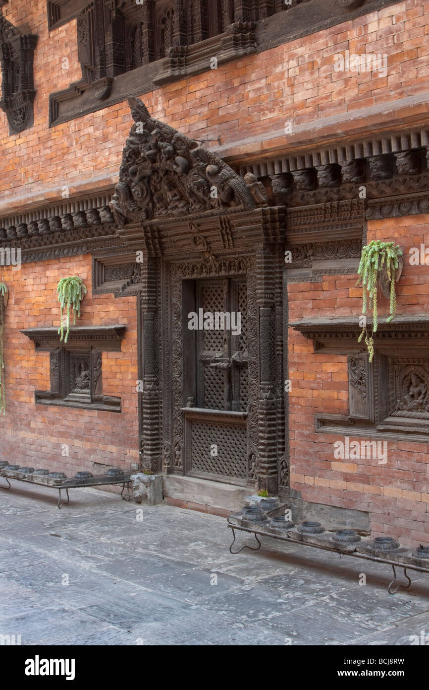 Kathmandu, Nepal.  Traditional Carved Wood Door and Windows now Installed in Dwarika's Hotel. Stock Photo