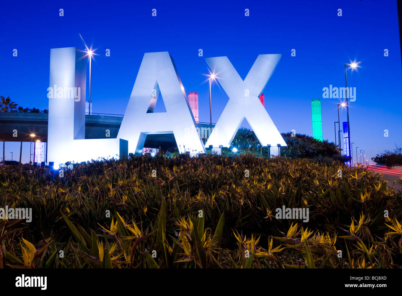 Three dimensional sign spelling out 'LAX' at entrance to Los  Angeles International Airport in Los Angeles, California; dusk. Stock Photo