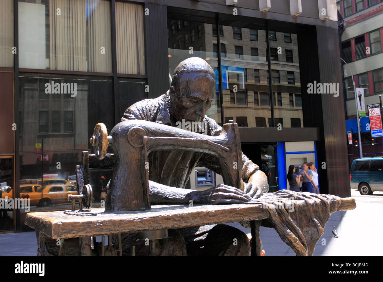 Statue honoring garment workers, the garment district, New York City USA Stock Photo