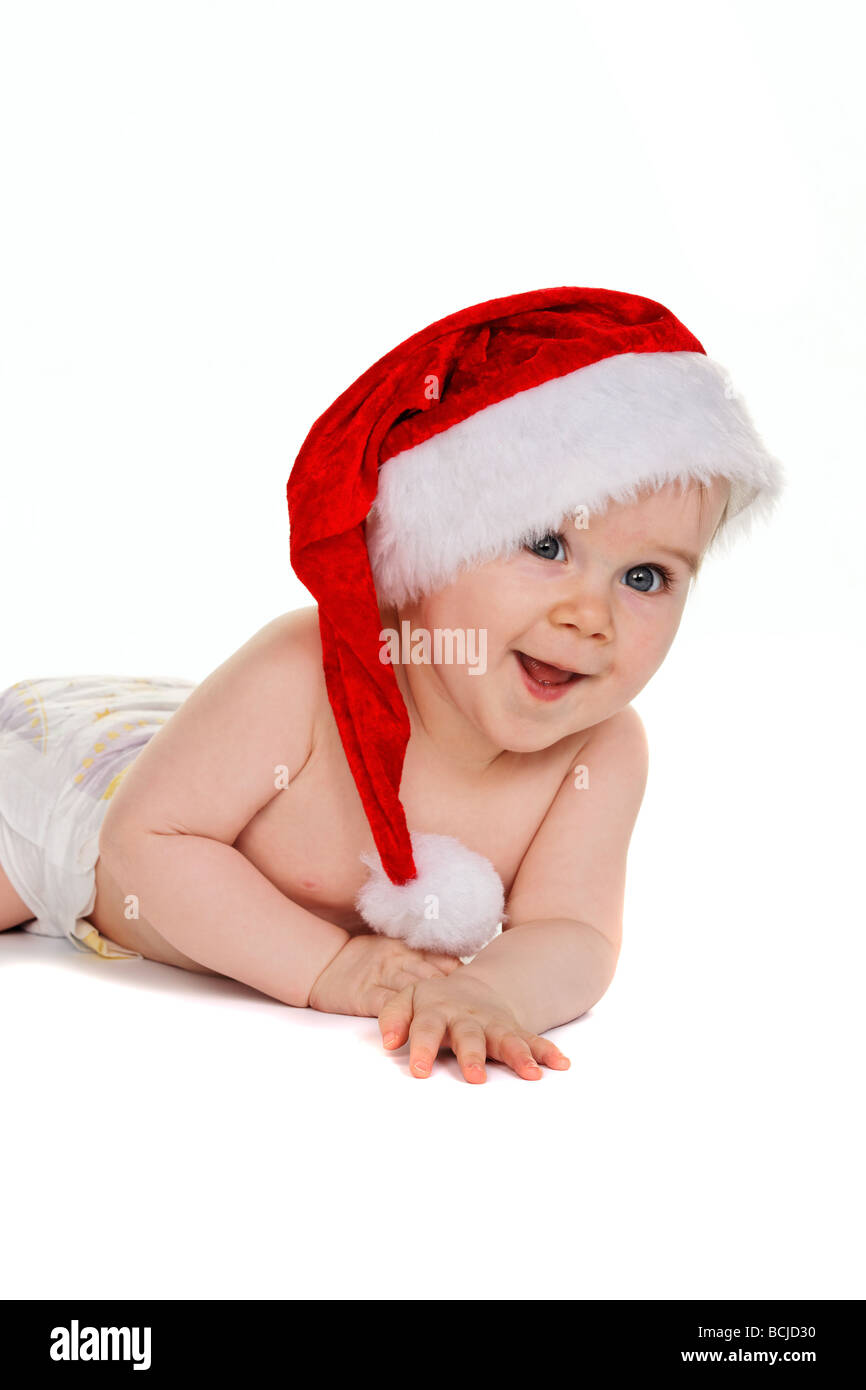 Small child with Santa Claus hat baby isolated on white background Stock Photo