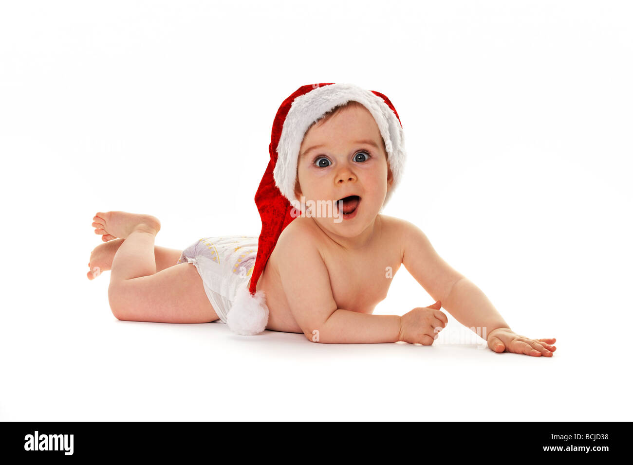 Small child with Santa Claus hat baby isolated on white background Stock Photo