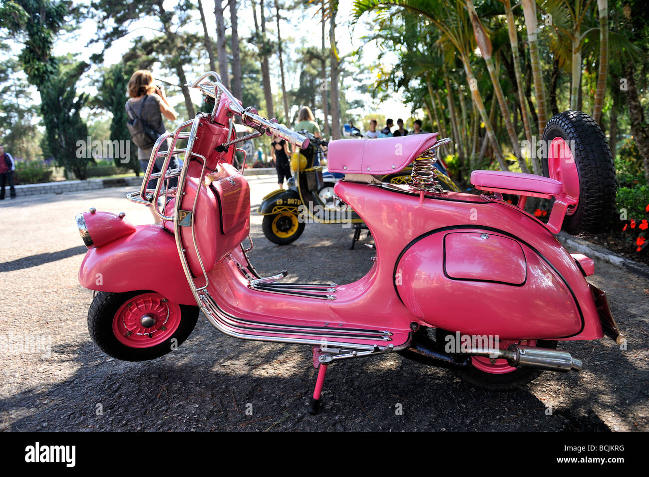 Classic antique pink Piaggio Vespa scooter, circa mid 1960s. Da Lat, Vietnam Stock Photo