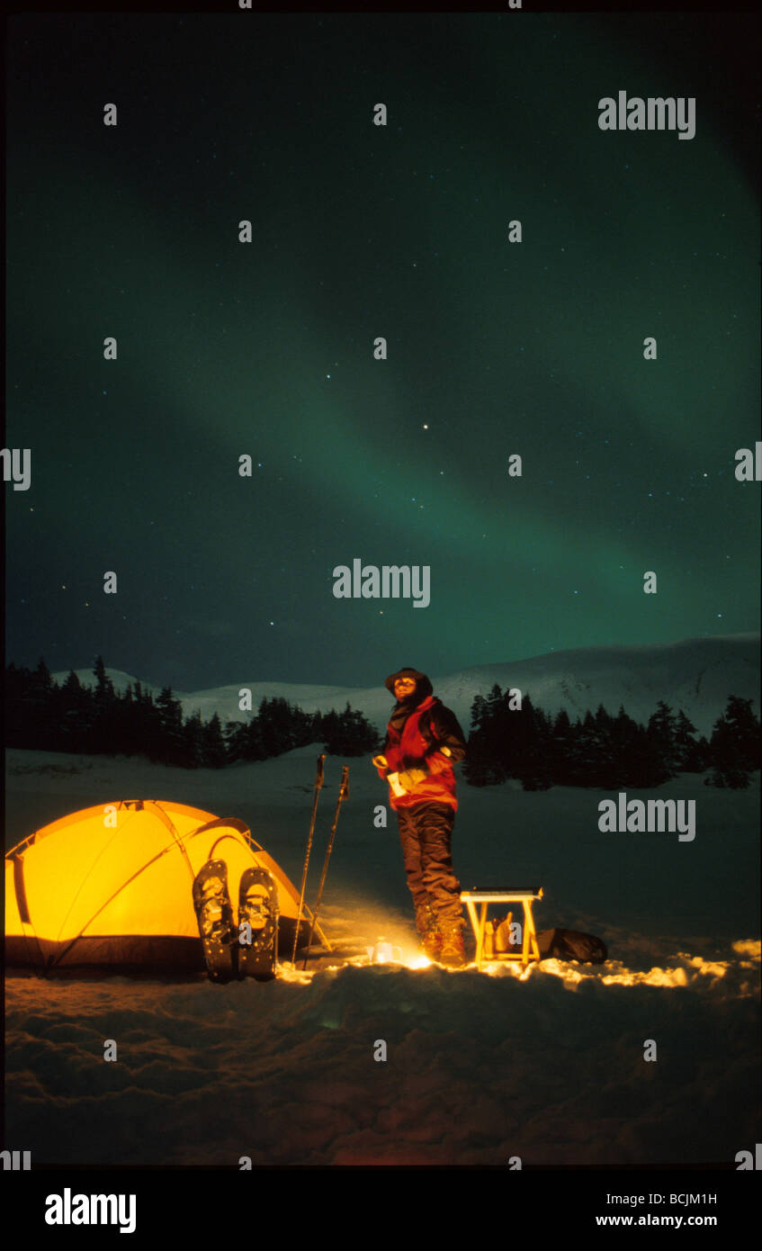 Man Sits @ Camp Northern Lights Turnagain Pass AK SC Stock Photo