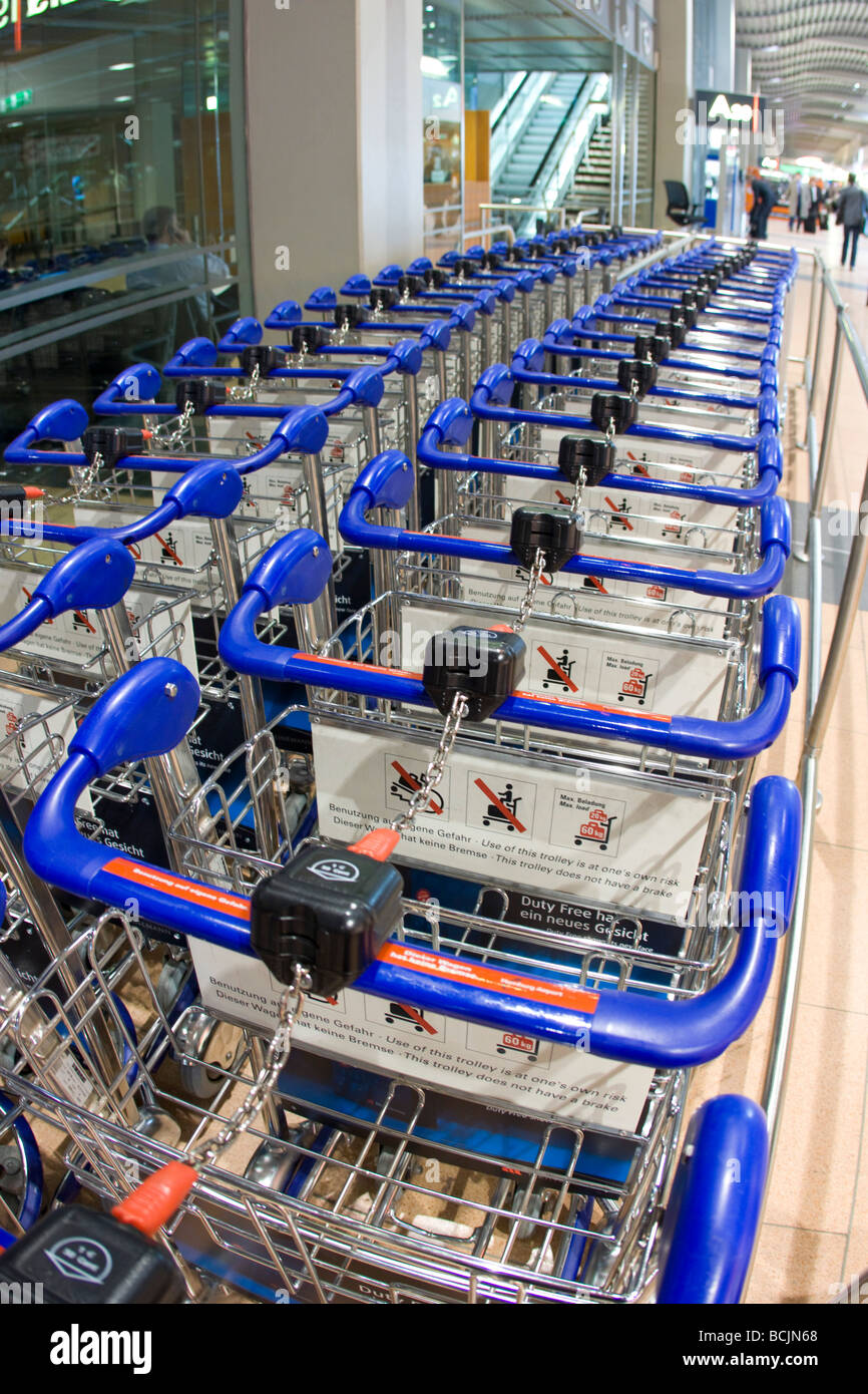 Airport trolleys in Airport Stock Photo