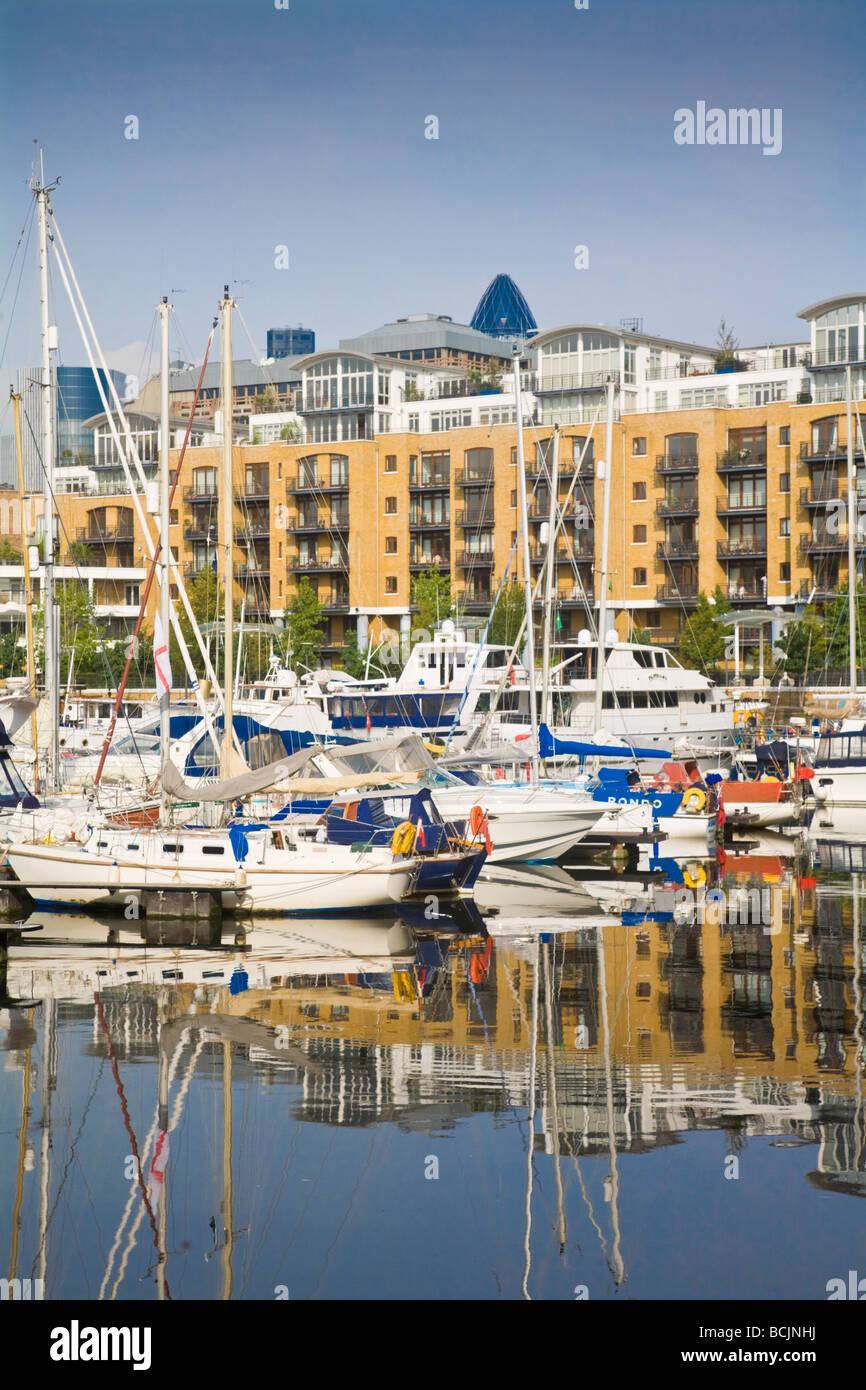 England, London, Wapping, St. Catherine's docks, Yatchs infront of waterfront app artments Stock Photo