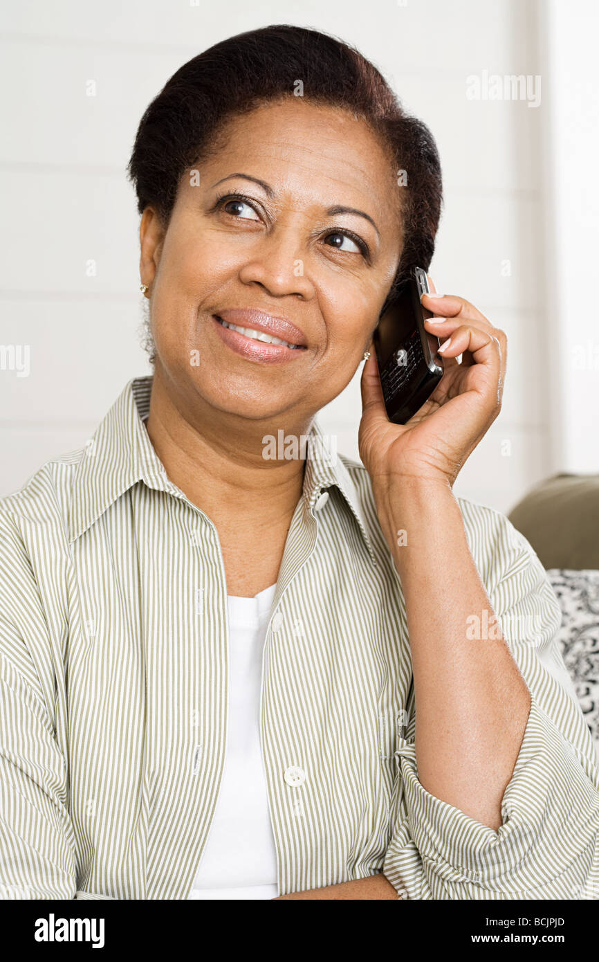 Mature woman on cellphone Stock Photo - Alamy