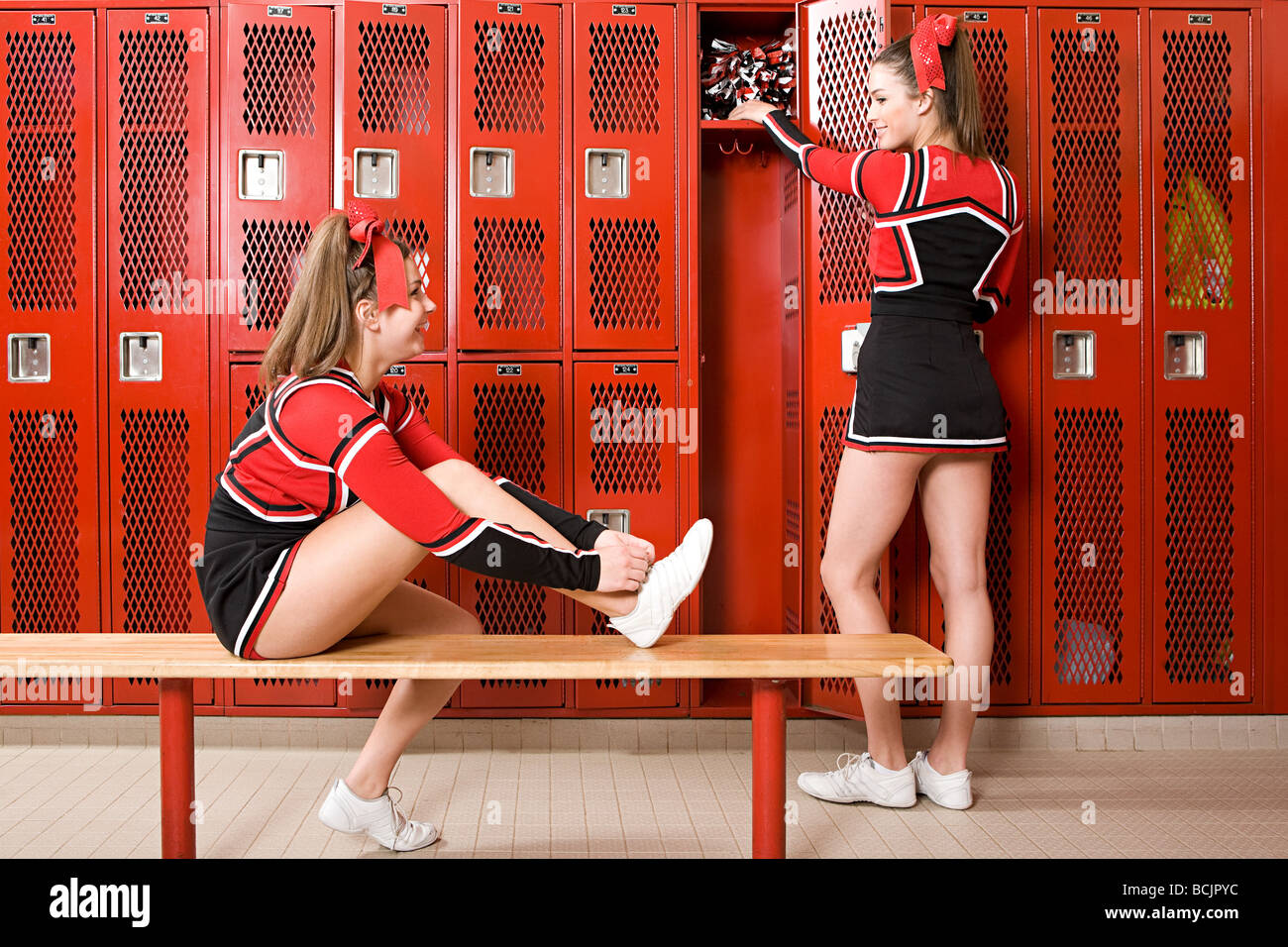 Cheerleaders in locker room Stock Photo